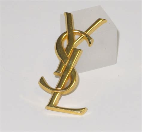 pin's yves saint laurent|Saint Laurent jewelry pins.